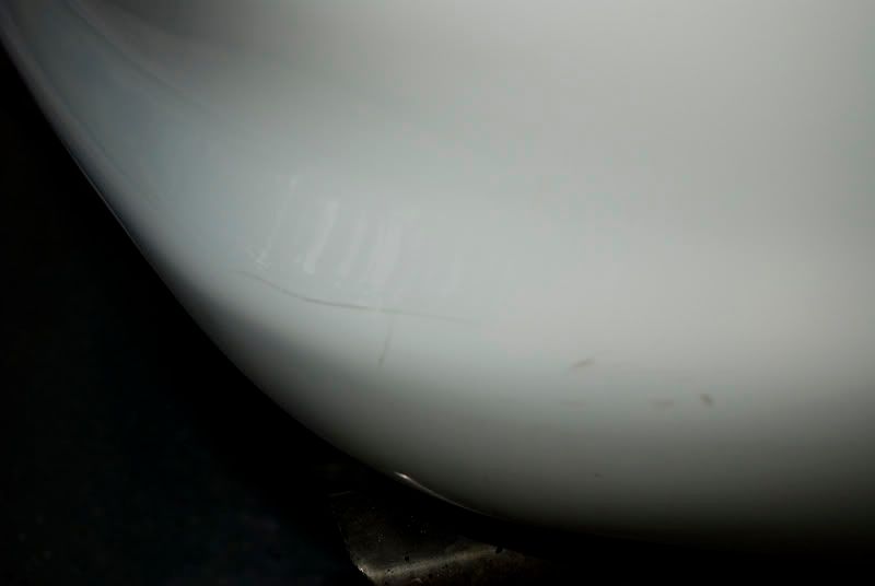 rearbumperrightscratch-before-2.jpg