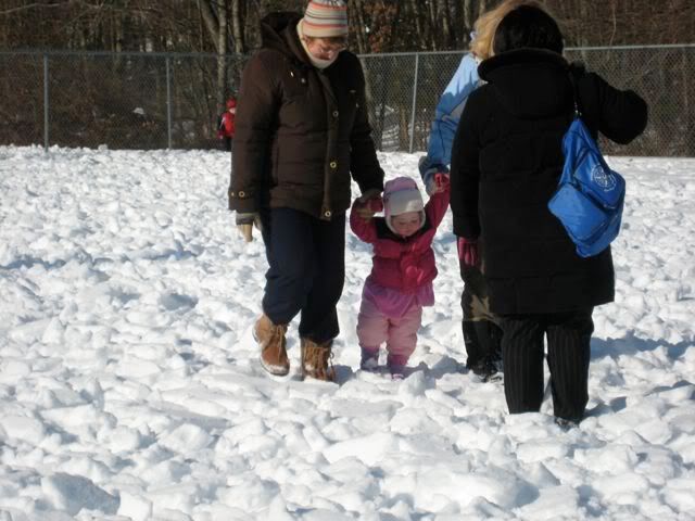 Sofia in snow with teachers