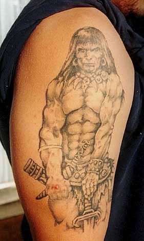 Conan arm tattoo