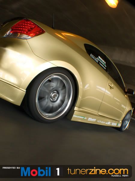 http://i9.photobucket.com/albums/a75/DRJETTA/gold_scion_tc_31.jpg