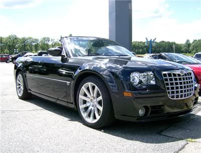 It's a 2006 Chrysler 300C SRT8 convertible made by'Coach Builders' and the