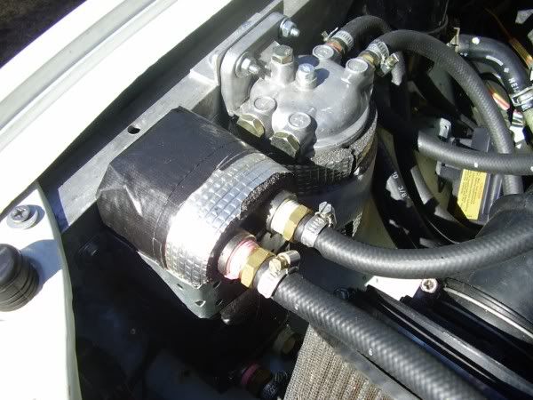 The fuel hoses traverse the engine bay to take advantage of the space where 
