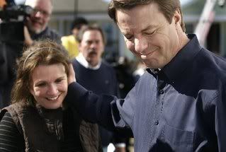 John Edwards, right, clasps his wife, Elizabeth, after announcing he would no longer seek the nomination. 