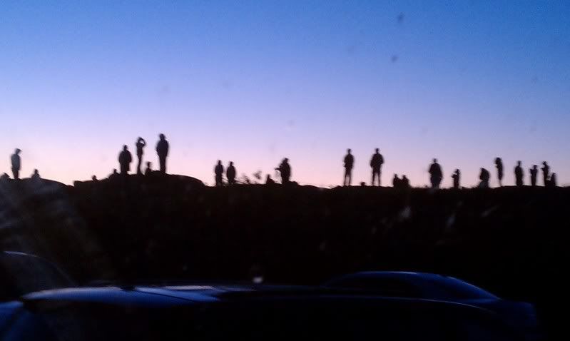 Silhouettes before sunrise on Cadillac Mountain, Maine