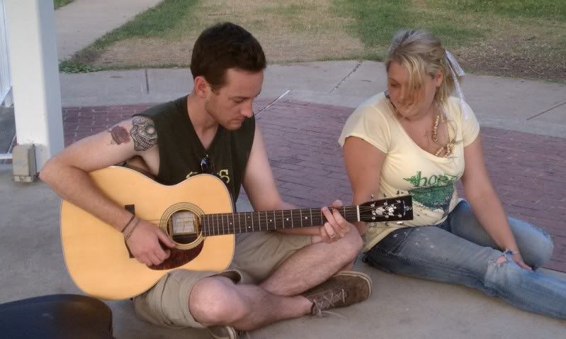 Zach serenades Bethany in the park