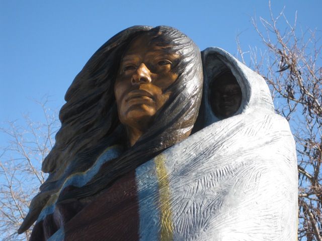 Native American with Cradleboard Statue