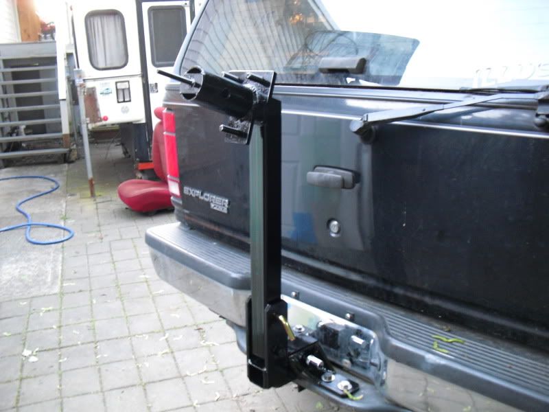 Hitch mounted spare tire carrier
