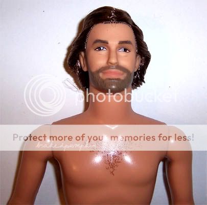 This handsome ken nude doll is mint, has never been played with.