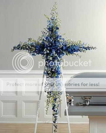 What flowers do you think of for funerals/memorials - Weddingbee
